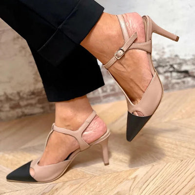 Beige stiletto heels with pointed toes