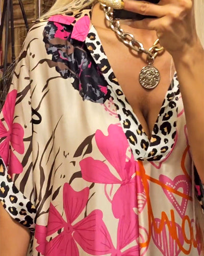 Deep V-neck dress with colourful leopard print